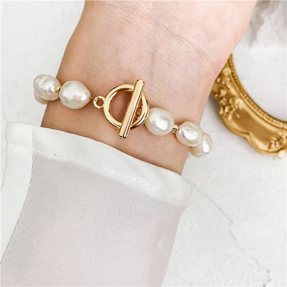 Pearl Bracelet with Golden Elements