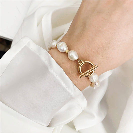 Pearl Bracelet with Golden Elements