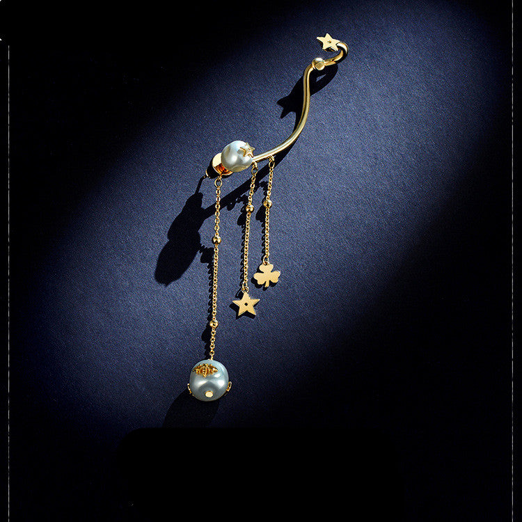 Full ear golden pearl earring