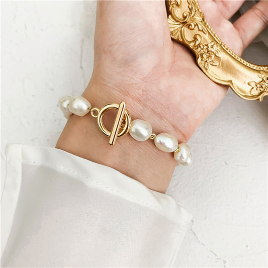 Pearl Bracelet with Golden Elements